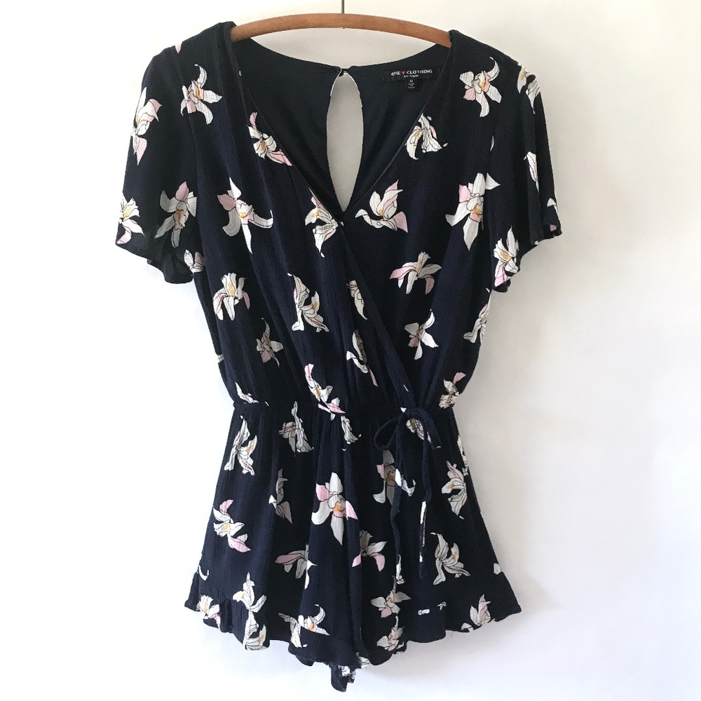 3/$15 One Clothing Navy Floral Flutter Sleeve Romper with Ruffle Edge
